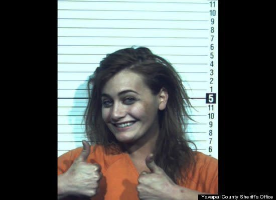 Watson beamed while taking her mugshot in 2011 despite having just been <a href="http://www.huffingtonpost.com/2011/11/22/smiling-mugshot-michelle-watson_n_1107926.html#s492707&title=Michelle_Watson" target="_blank">charged with aggravated assault on a police officer, resisting arrest, and driving under the influence </a>in Arizona. 