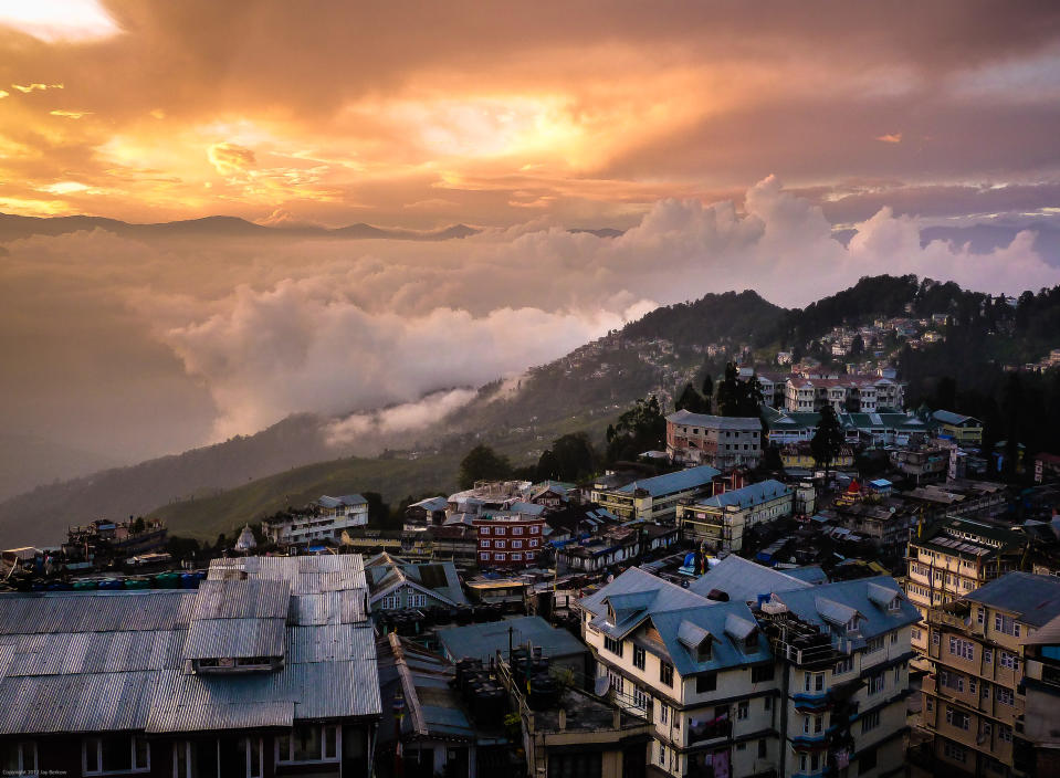 This was taken from the hills above the city on a late afternoon when clouds covered the valleys and the sun broke through in the distance.