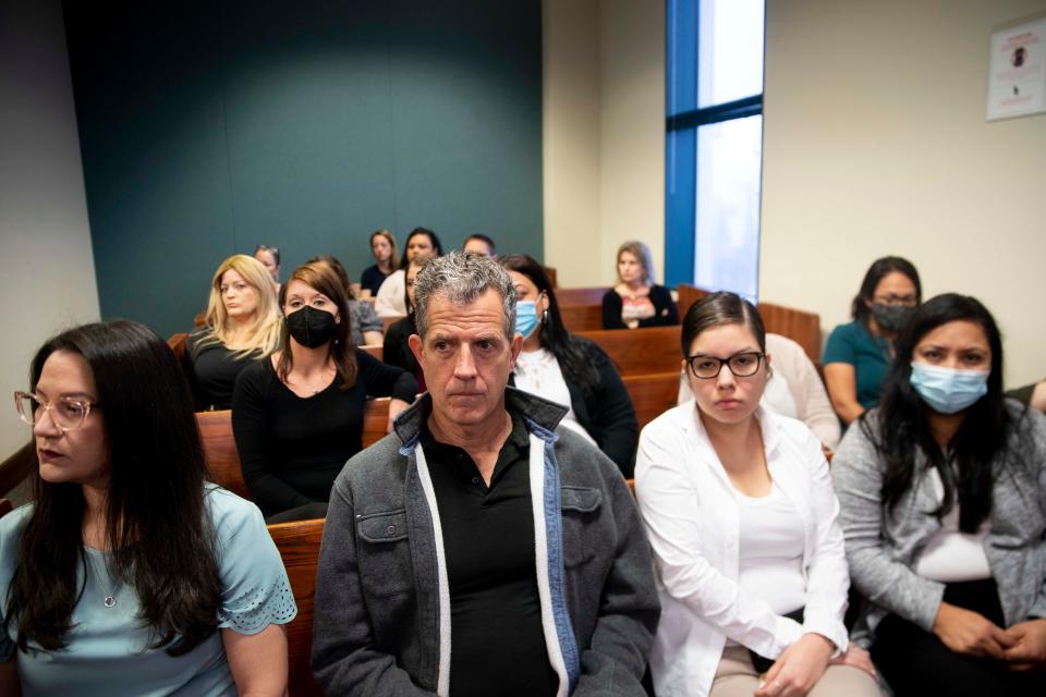 Members of the courtroom sit during the plea hearing of Hector Manley, Friday, Jan. 21, 2022, at Collier County Courthouse. Manley, a former teacher at Parkside Elementary School, was found guilty on 20 counts of lewd and lascivious molestation of a child under 12.
