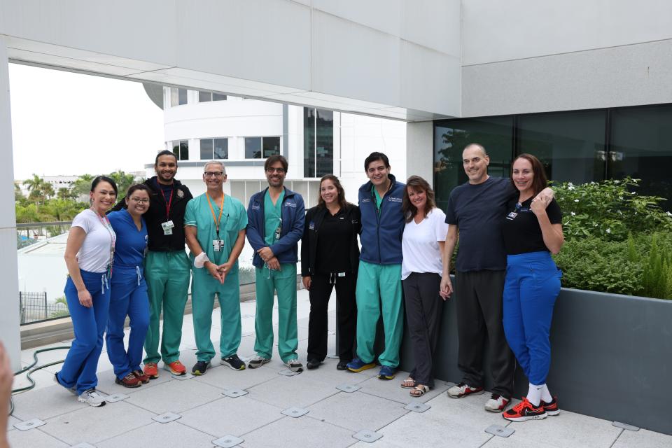 Tim Cornett, second from right, poses with his transplant team at Jackson Memorial Hospital in Miami. The Plymouth resident received two new lungs because of the damage COVID-19 did to his lungs.