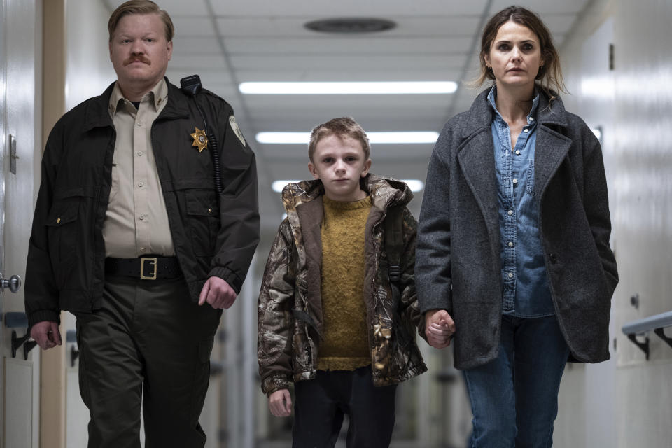 This image released by Searchlight Pictures shows Jesse Plemmons, from left, Jeremy T. Thomas and Keri Russell in a scene from "Antlers." (Kimberly French/Searchlight Pictures via AP)