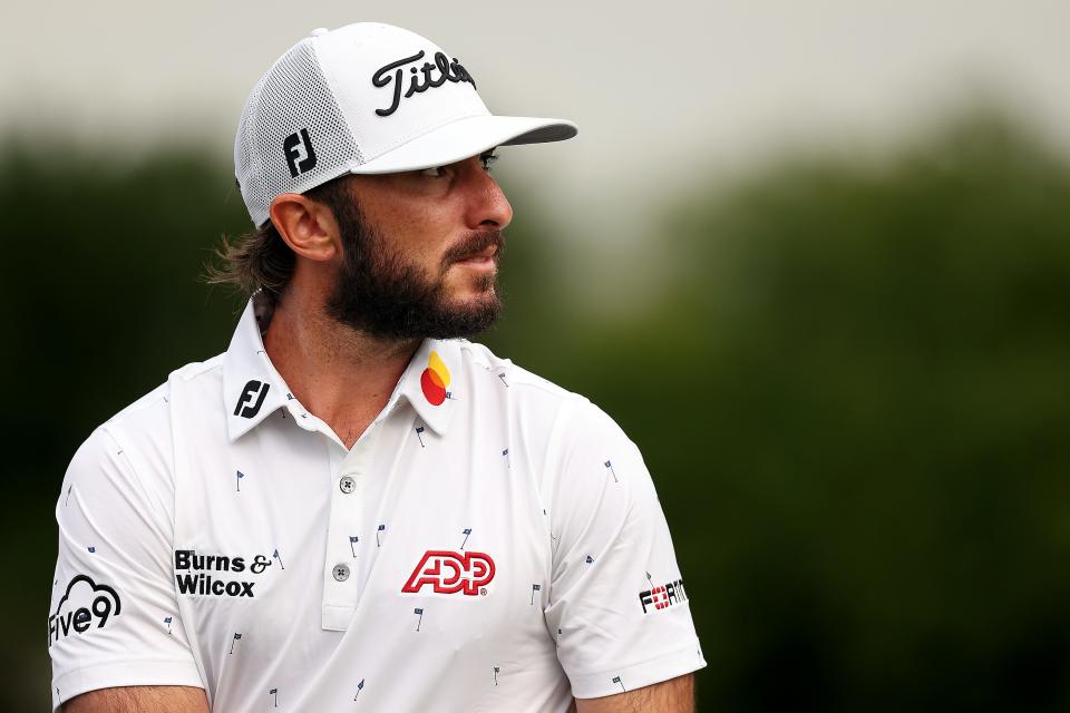 Max Homa watches his tee shot on the 18th hole during the Pro-Am one day prior to the Rocket Mortgage Classic at Detroit Golf Club on July 27, 2022.