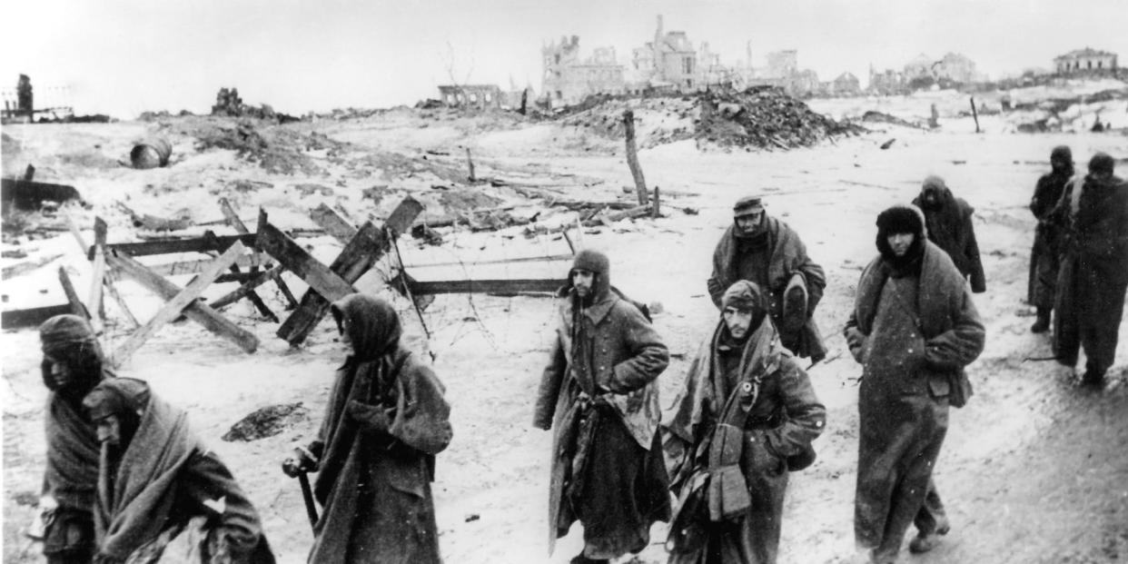 Captured German soldiers, make their way in the bitter cold through the ruins of Stalingrad, Russia, in 1943.