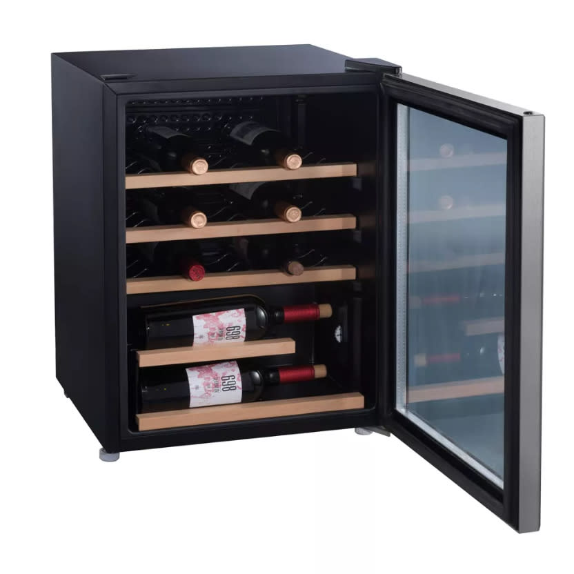 the miniature wine fridge filled with bottles