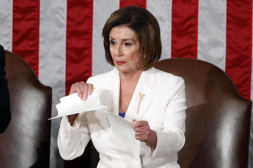 House Speaker Nancy Pelosi tears her copy of President Trump's State of the Union address after he delivered it to a joint session of Congress on Tuesday. (AP Photo/Alex Brandon)