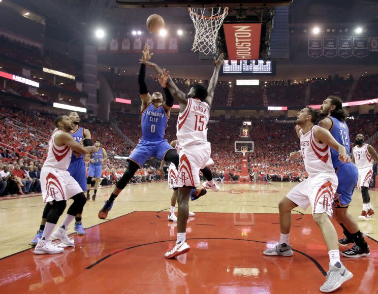 Russell Westbrook attacks the Rockets defense. (AP)