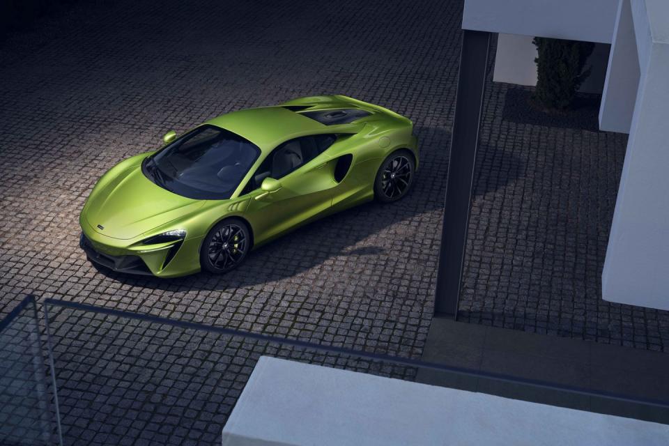 <p>McLaren embraces a hybridized future of high performance with the sculptural 2023 Artura supercar. The <a href="https://www.caranddriver.com/news/a35522372/2022-mclaren-artura-revealed/" rel="nofollow noopener" target="_blank" data-ylk="slk:newly introduced mid-engine two-seater;elm:context_link;itc:0" class="link ">newly introduced mid-engine two-seater</a> rides on a new lightweight platform. It also pairs a twin-turbo V-6–the company's first—with a battery-electric powertrain to create a plug-in-hybrid model—another first. The duo generates a combined 671 horsepower and 531 pound-feet of torque. Performance estimates are highlighted by a zero-to-60-mph time of 2.6 seconds and a top speed of 205 mph. Its bodywork is pure <a href="https://www.caranddriver.com/mclaren" rel="nofollow noopener" target="_blank" data-ylk="slk:McLaren;elm:context_link;itc:0" class="link ">McLaren</a>, complete with prominent air vents and scissor-style doors. Along with a more premium and spacious interior than the <a href="https://www.caranddriver.com/mclaren/720s" rel="nofollow noopener" target="_blank" data-ylk="slk:720S;elm:context_link;itc:0" class="link ">720S</a>, the 2023 Artura offers several convenience and driver-assistance features.</p><p><a class="link " href="https://www.caranddriver.com/mclaren/artura" rel="nofollow noopener" target="_blank" data-ylk="slk:Review, Pricing, and Specs;elm:context_link;itc:0">Review, Pricing, and Specs</a></p>