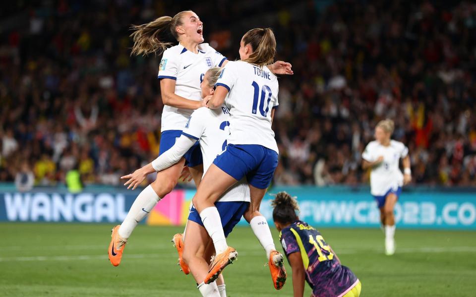 Alessia Russo of England celebrates with teammates Georgia Stanway and Ella Toone after scoring her team's second goal during the FIFA Women's World Cup Australia & New Zealand 2023 Quarter Final match between England and Colombia at Stadium Australia on August 12, 2023 in Sydney, Australia. (Photo by Naomi Baker