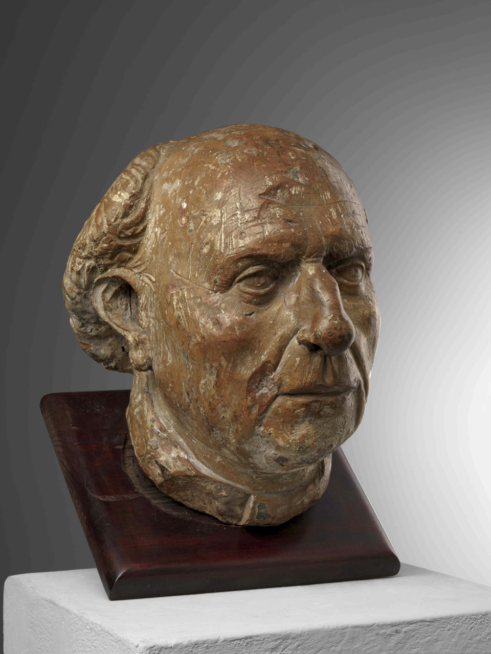 This image released by the Opera di Santa Maria del Fiore on Thursday, May 23, 2024, shows a terracotta portrait of Florence landmark cathedral's architect Filippo Brunelleschi dating back to the early Renaissance, which was recently found among the furnishings of an historic residence near the Tuscan capital. The Opera di Santa Maria del Fiore said the discovery of the previously unknown, 700-year-old sculpture sculptured from a solid block of clay by Brunelleschi's adoptive son Andrea di Lazzaro Cavalcanti, was "exceptional" both for its artistic value and because portraits of Brunelleschi around the time of his death are rare.(Opera di Santa Maria del Fiore via AP, HO)