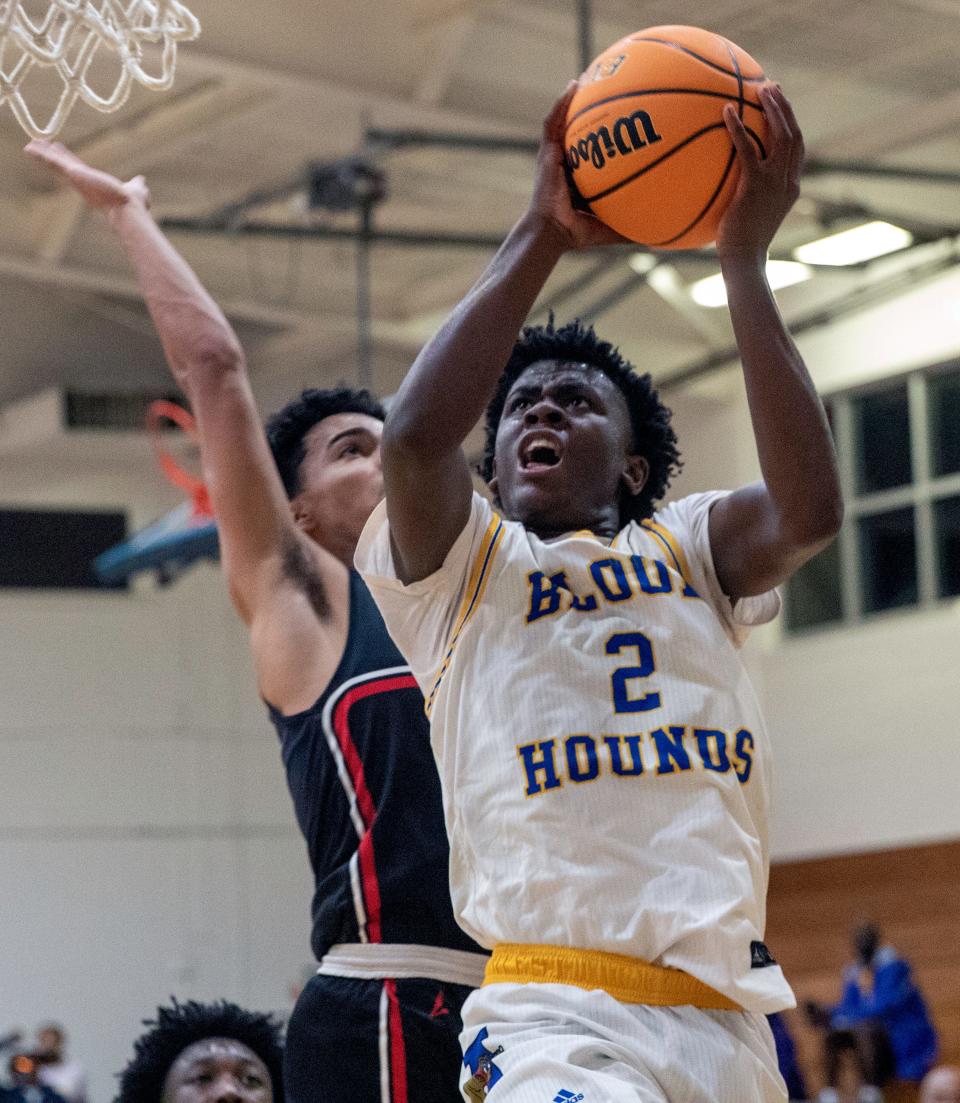 Auburndale's Kervin Knaggs goes up for a shot against Gateway on Wednesday night in the Class 5A, District 7 semifinals at Auburndale.