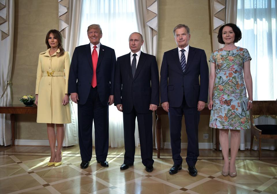 <p>(Left to right) U.S. First Lady Melania Trump, U.S. President Donald Trump, Russia’s President Vladimir Putin, Finnish President Sauli Niinisto and his wife Jenni Haukio pose at the Presidential Palace in Helsinki, on July 16, 2018. (Photo: Aleksey Nikolskyi/Getty Images) </p>