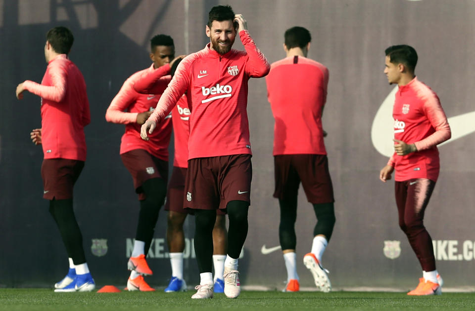 FC Barcelona's Lionel Messi, center, takes part in a training session at the Sports Center FC Barcelona Joan Gamper in Sant Joan Despi, Spain, Tuesday, April 30, 2019. FC Barcelona will play against Liverpool in a first leg semifinal Champions League soccer match on Wednesday, May 1. (AP Photo/Manu Fernandez)