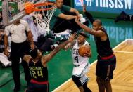 Apr 22, 2016; Boston, MA, USA; Boston Celtics guard Isaiah Thomas (4) works the ball against Atlanta Hawks center Al Horford (15) and forward Kent Bazemore (24) during the fourth quarter in game three of the first round of the NBA Playoffs at TD Garden. Mandatory Credit: David Butler II-USA TODAY Sports