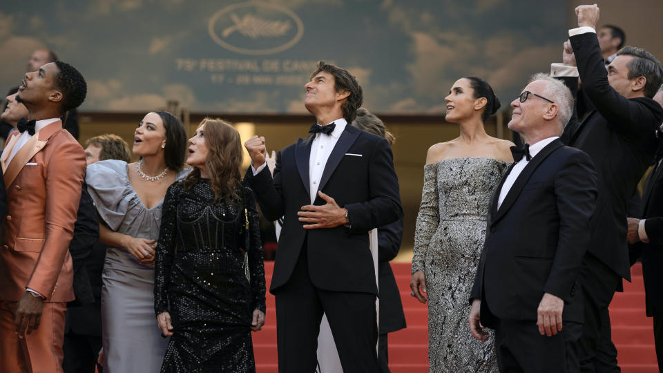 The “Top Gun: Maverick” cast watches jets pass by the Cannes premiere. - Credit: AP Photo/Petros Giannakouris