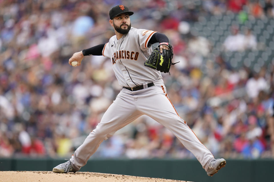 San Francisco Giants starting pitcher Jakob Junis delivers against the Minnesota Twins during the second inning of a baseball game Sunday, Aug. 28, 2022, in Minneapolis. (AP Photo/Abbie Parr)