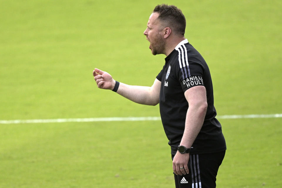 Vancouver Whitecaps head coach Marc Dos Santos calls out instructions during the first half of an MLS soccer match against Toronto FC, Saturday, April 24, 2021, in Orlando, Fla. (AP Photo/Phelan M. Ebenhack)