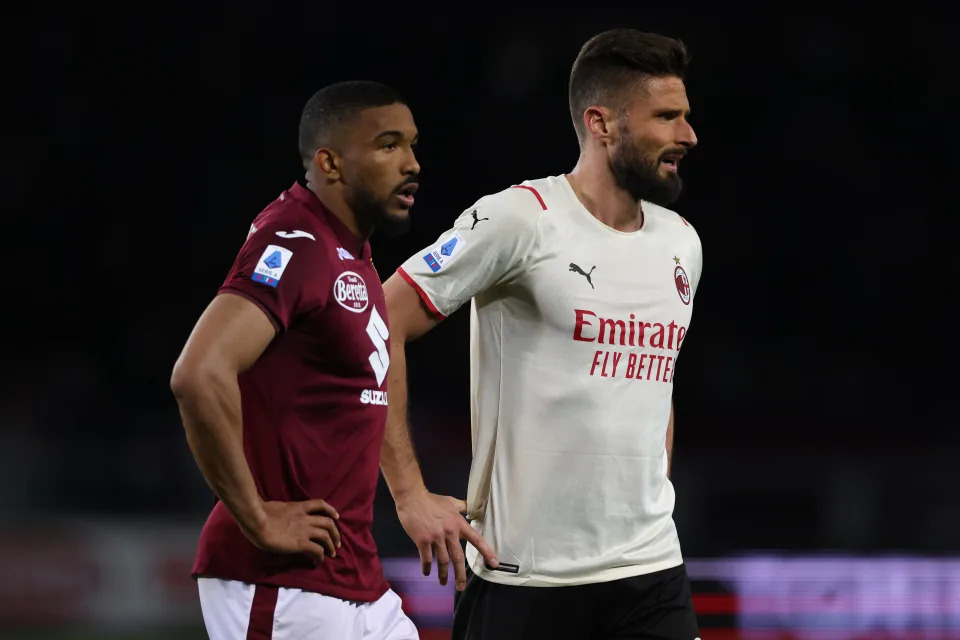 TURIN, ITALY - APRIL 10: Gleison Bremer of Torino FC and Olivier Giroud of AC Milan look on during the Serie A match between Torino FC v AC Milan on April 10, 2022 in Turin, Italy. (Photo by Jonathan Moscrop/Getty Images)