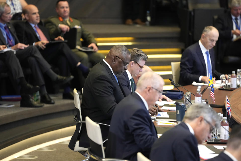 United States Secretary of Defense Lloyd Austin, center, attends a meeting of the North Atlantic Council in defense ministers format at NATO headquarters in Brussels, Thursday, Oct. 12, 2023. (AP Photo/Virginia Mayo)