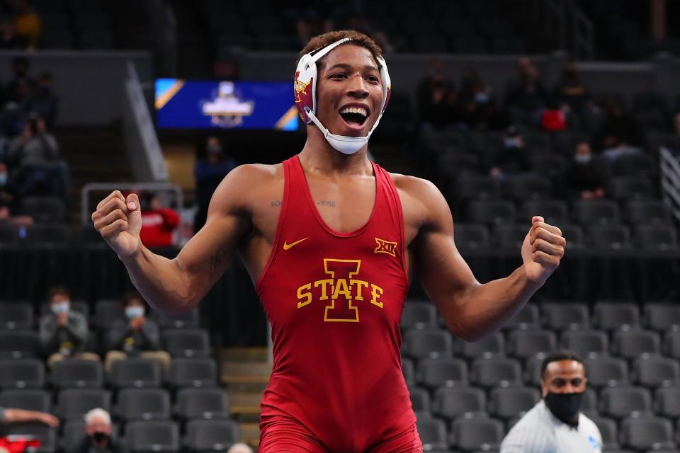 ST LOUIS, MO -  MARCH 20: David Carr of Iowa State celebrates after beating Jesse Dellaveccia of Rider in the 157lb weight class in the first-place match during the NCAA Division I Men's Wrestling Championship at the Enterprise Center on March 20, 2021 in St Louis, Missouri.