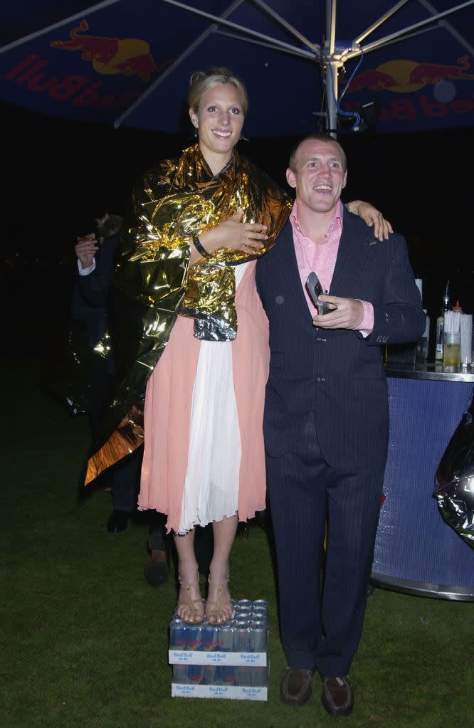 Zara and Mike Tindall hugging at a charity gala