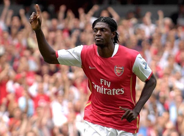 Emmanuel Adebayor celebrates scoring for Arsenal