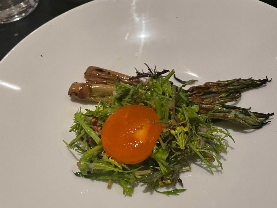 Japanese knotweed served with brassica salad and a cured egg yolk at Silo, Hackney Wick (Kate Ng)