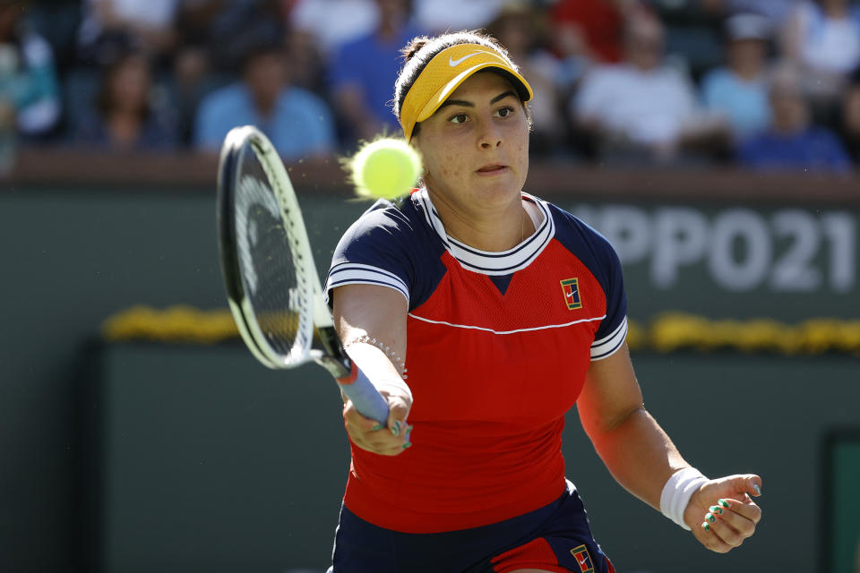 INDIAN WELLS, CALIFORNIA - OCTOBER 11: Bianca Andreescu of Canada returns a shot to Anett Kontaveit of Estonia during the BNP Paribas Open at the Indian Wells Tennis Garden on October 11, 2021 in Indian Wells, California. (Photo by Tim Nwachukwu/Getty Images)