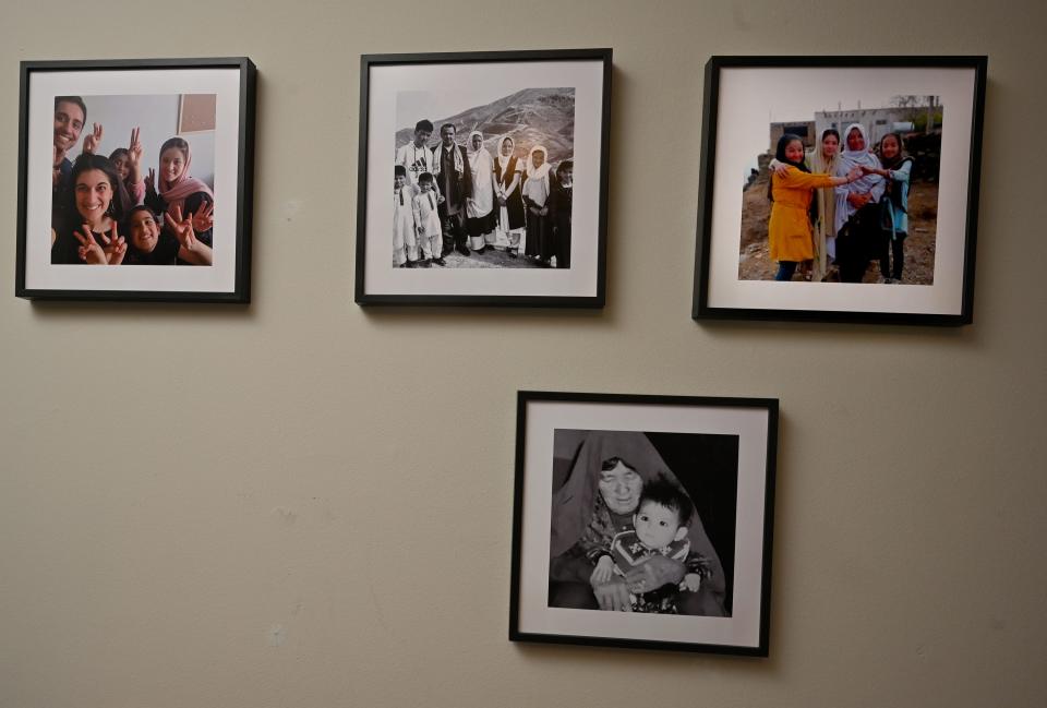 Afghan refugee Kubra Mohammadi, a junior at Shrewsbury High School, keeps photos in her bedroom of her family.