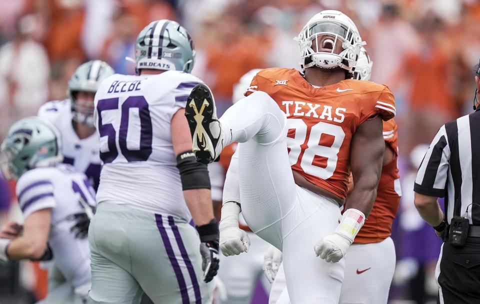 Texas defensive end Barryn Sorrell celebrates his sack of Kansas State quarterback Will Howard in the first quarter Nov. 4 at Royal-Memorial Stadium. It was Sorrell's sack on the final play in overtime, however, that saved Texas' 33-30 win.