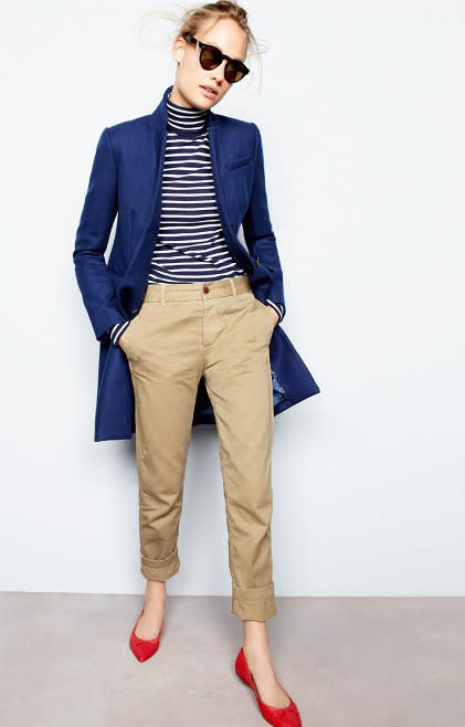 Channel your inner garçonne with a bateau-striped turtleneck and boyish khaki pants — very French navy-goes-glam.