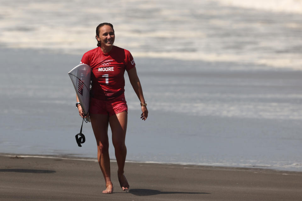 ICHINOMIYA, JAPAN - JULY 27: Carissa Moore of Team United States celebrates after her win against Amuro Tsuzuki of Team Japan on day four of the Tokyo 2020 Olympic Games at Tsurigasaki Surfing Beach on July 27, 2021 in Ichinomiya, Chiba, Japan. (Photo by Ryan Pierse/Getty Images)