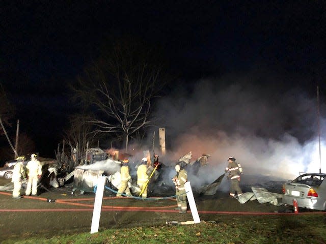 A photograph shows the remains of Lincolns and Things on Tuesday in Sherrodsville. A fire Monday destroyed the structure, which warehoused approximately 8,000 toys for Tuscarawas County Toys for Tots.