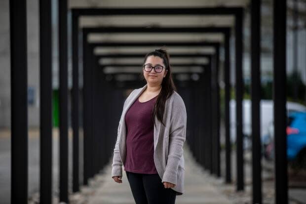 Christina Sall, 28, has suffered from chronic migraines since she was five years old. She found one drug that helps her, but it's more than $500 a month. She's calling on the provincial government to include Aimovig in PharmaCare coverage.  (Ben Nelms/CBC - image credit)
