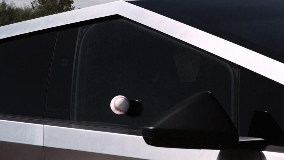 a black car with a white ball in the front