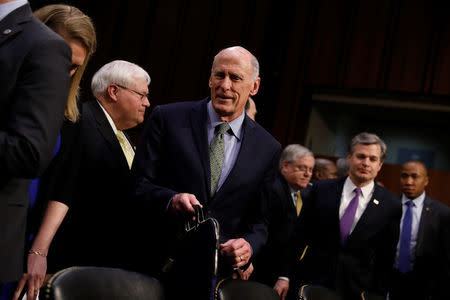 Director of National Intelligence (DNI) Dan Coats arrives to testify before the Senate Intelligence Committee on Capitol Hill in Washington, U.S., February 13, 2018. REUTERS/Aaron P. Bernstein