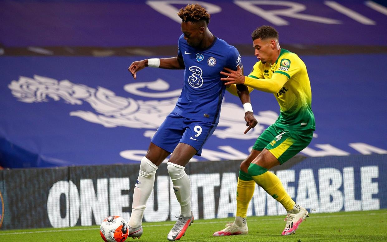 Tammy Abraham of Chelsea holds off Ben Godfrey of Norwich City - GETTY IMAGES