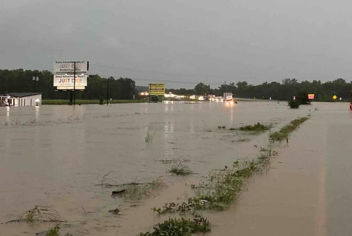 Severe flooding is seen on US Highway 59 near Choates Creek in Polk County. <cite>Credit: TxDOT Lufkin social media</cite>