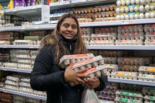 PHOTO: Sharmilla Dabieden grabs three cartons of eggs from Whole Foods, traveling into Tribeca from Queens for the more affordable prices. (ABC News)