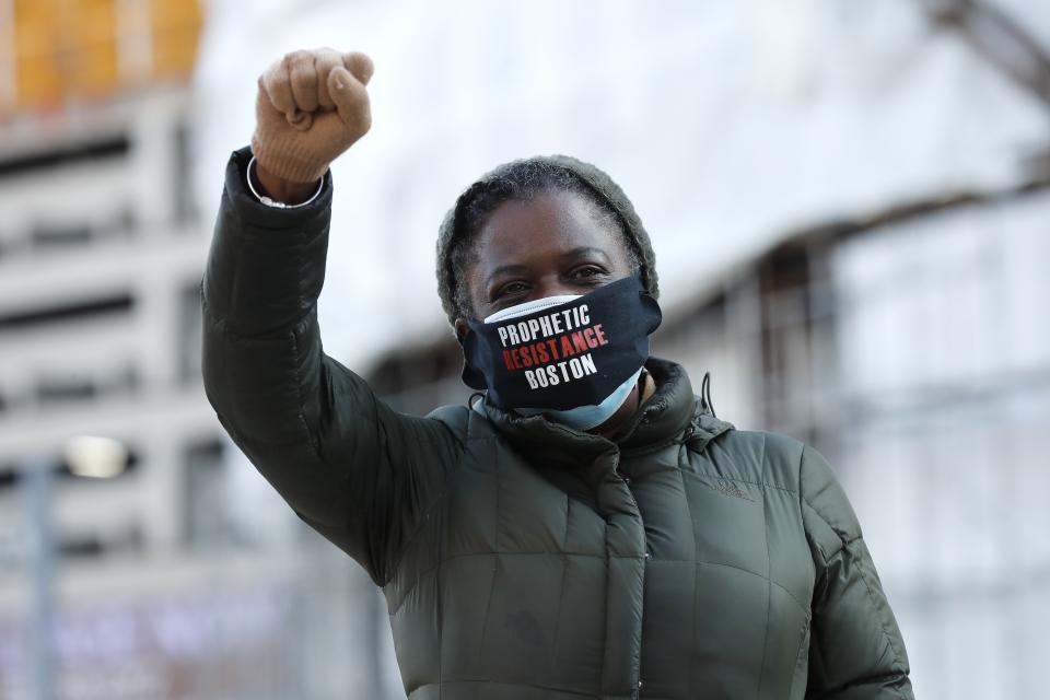 Tenants' rights advocate Danielle Willams demonstrates outside the Edward W. Brooke Courthouse, Wednesday, Jan. 13, 2021, in Boston. The protest was part of a national day of action calling on the incoming Biden administration to extend the eviction moratorium initiated in response to the Covid-19 pandemic. (AP Photo/Michael Dwyer)
