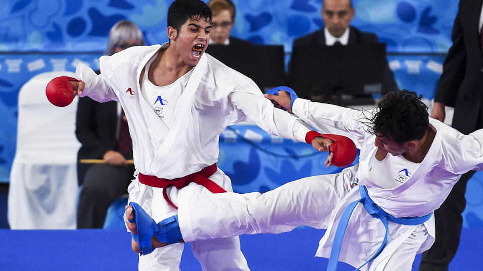 Navid Mohammadi fights Nabil Ech-Chaabi at the Youth Olympic Games 2018. (Photo by Marcelo Endelli/Getty Images)