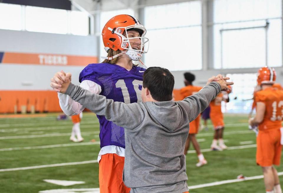 Clemson quarterback Trevor Lawrence (16) with team manager David Saville during the Tigers Cotton Bowl practice on Wednesday, December 12, 2018. Clemson Football Practice