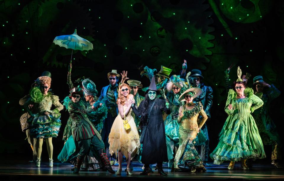 The cast of the national tour of the musical "Wicked" performs.