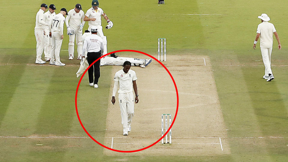 Jofra Archer, pictured here appearing to walk away rather than check on Steve Smith. (Photo by Ryan Pierse/Getty Images)