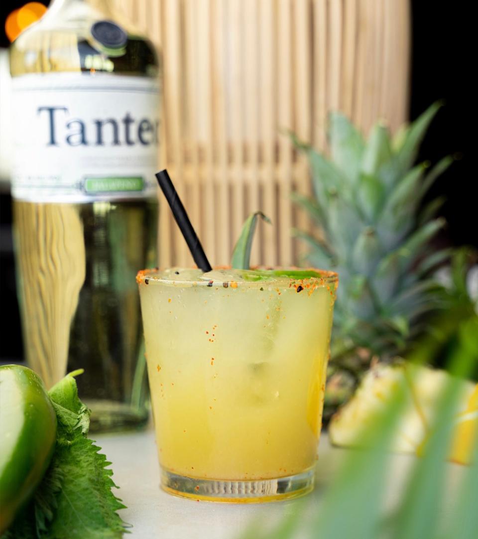A pineapple jalapeno margarita from Teak Restaurant in Red Bank, featuring Tanteo jalapeno tequila, pineapple juice, agave and lime.