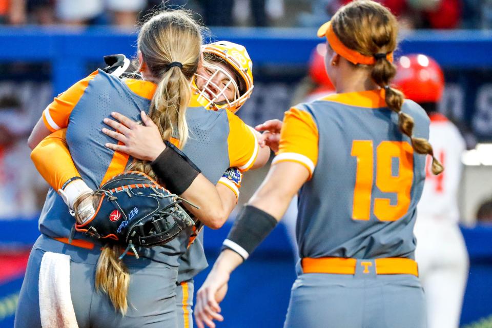 Tennessee players celebrate after winning a softball game between Oklahoma State (OSU) and Tennessee at the Women's College World Series at USA Softball Hall of Fame Stadium in Oklahoma City on Sunday, June 4, 2023.