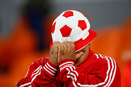 A Peru fan after the match against France. REUTERS/Jason Cairnduff