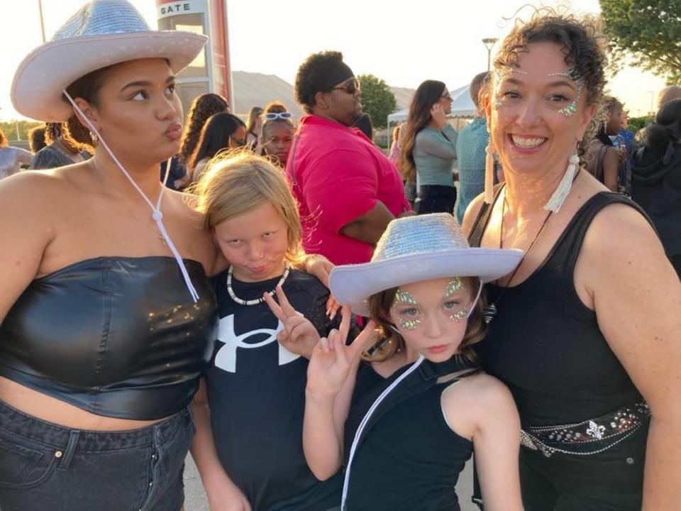 Jenny Tracz, right, brought her daughter Olive, 10, niece Onesti McMurray, 19, and nephew, Presley Stanley, 10, to the concert.