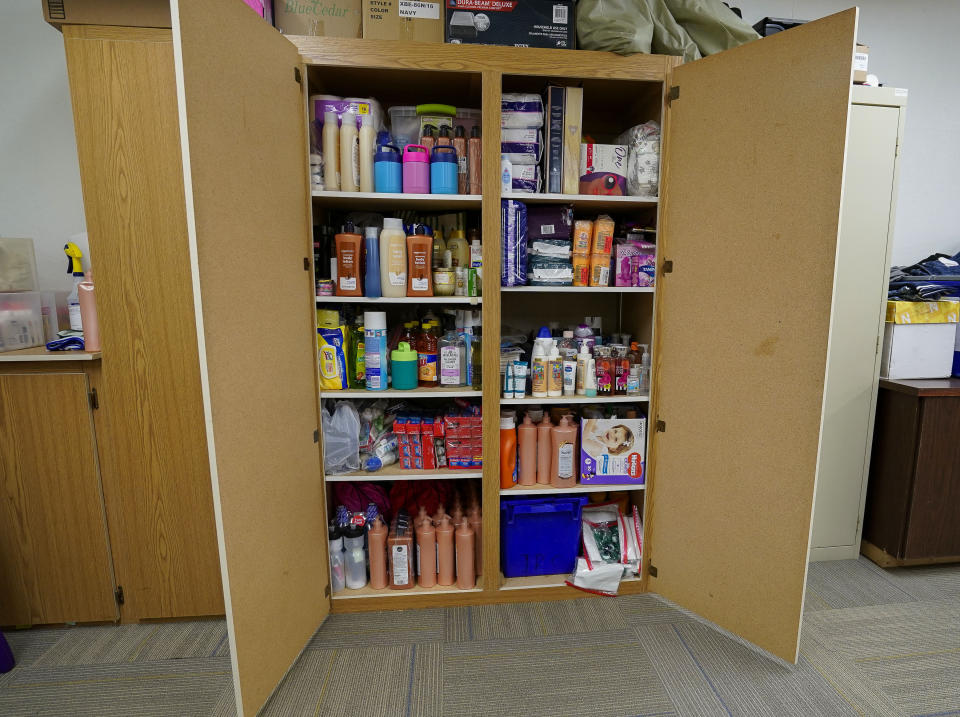 Food pantry and essentials at Frye Elementary School in Chandler, Arizona to help family who experience homeless Tuesday, May 23, 2023. (AP Photo/Darryl Webb)