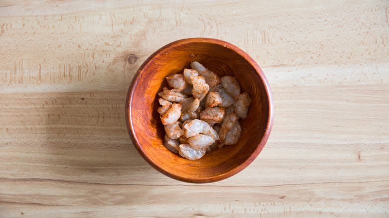 seasoned shrimp in wooden bowl 