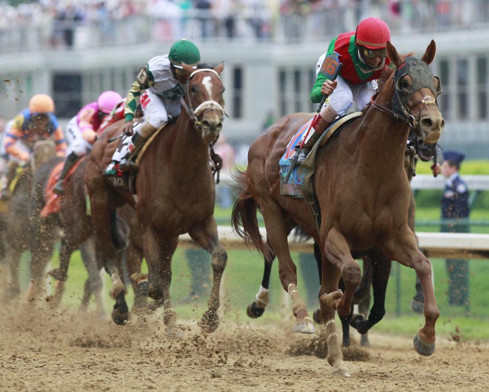 FILE - In this Saturday, May 7, 2011 file photo, John Velazquez rides Animal Kingdom to victory during the 137th Kentucky Derby horse race at Churchill Downs in Louisville, Ky. Although Louisville is best-known for the Derby, visitors in town for the May 5, 2012 race will find plenty of other things to do and see around town, from museums to historic hotels to trendy restaurants. (AP Photo/Michael Conroy)